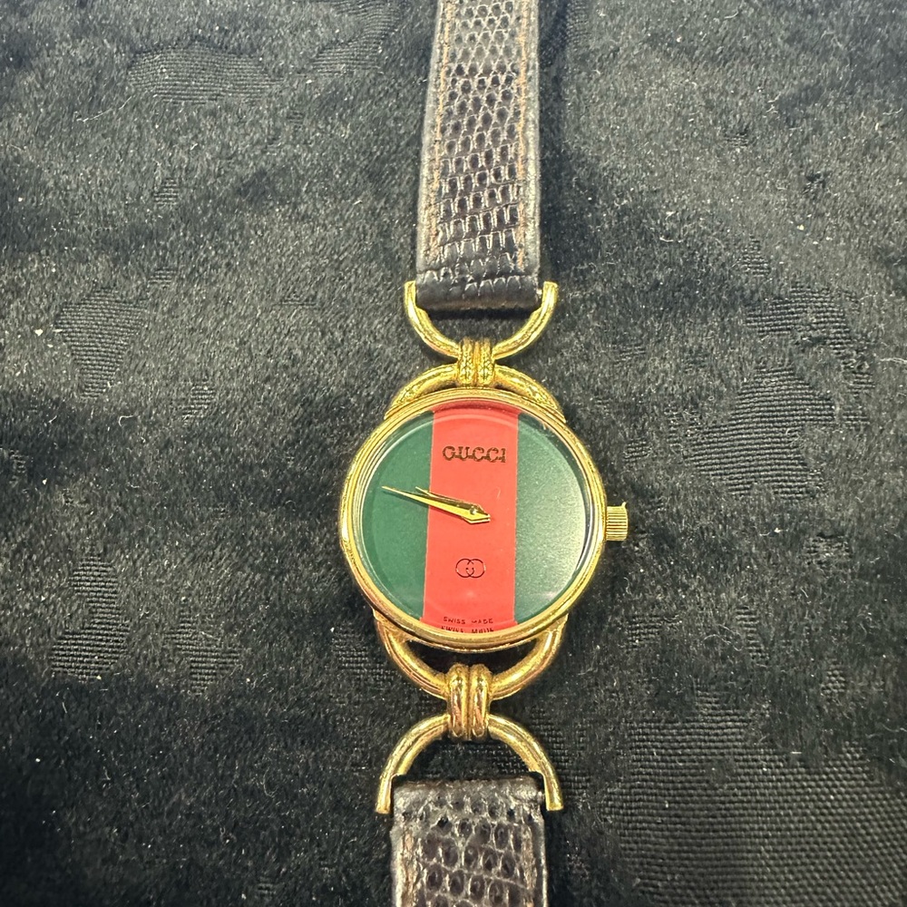 Gucci Gp Ladies Watch with green and red dial.  Quartz movement